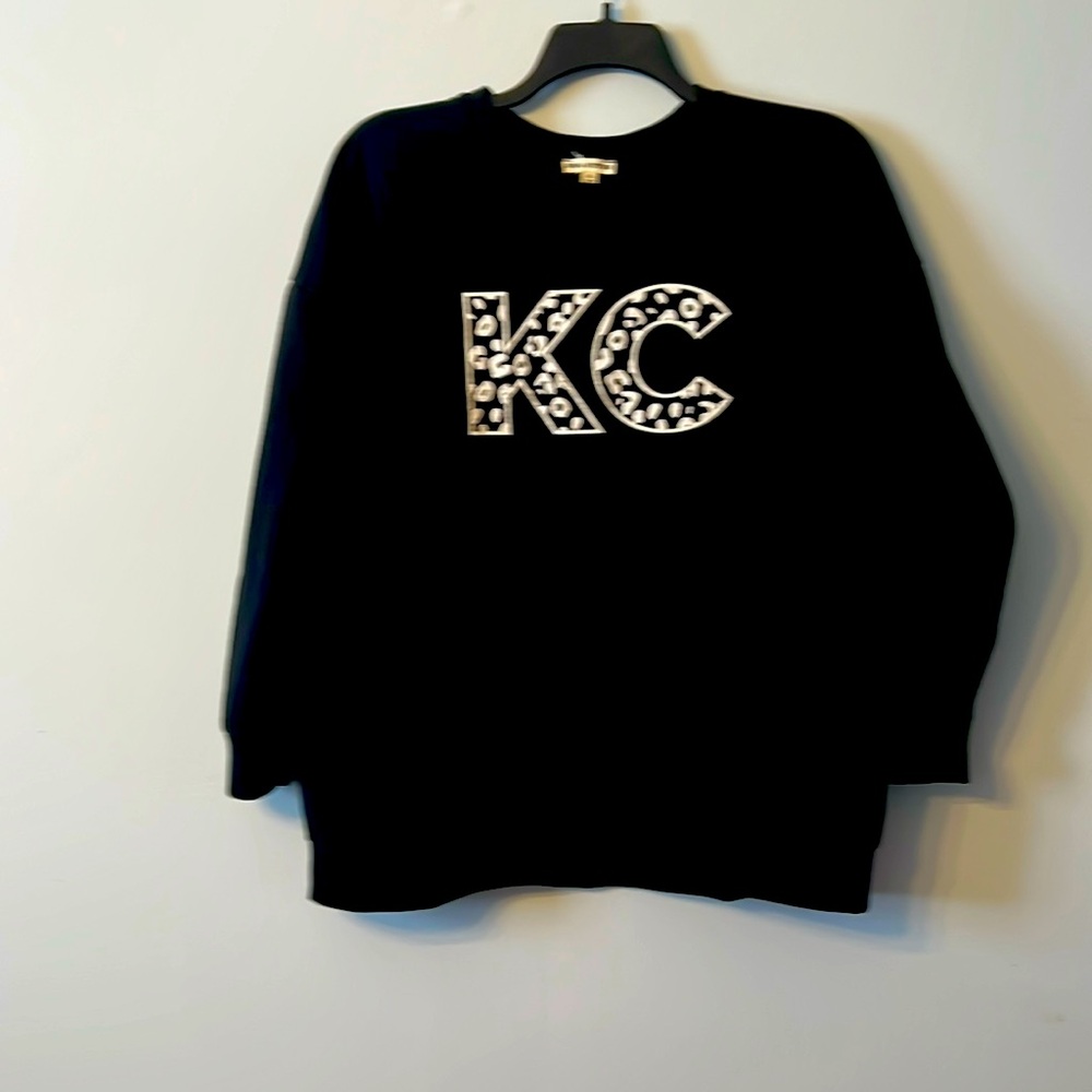 Warm and cozy KC sweatshirt with pockets!!